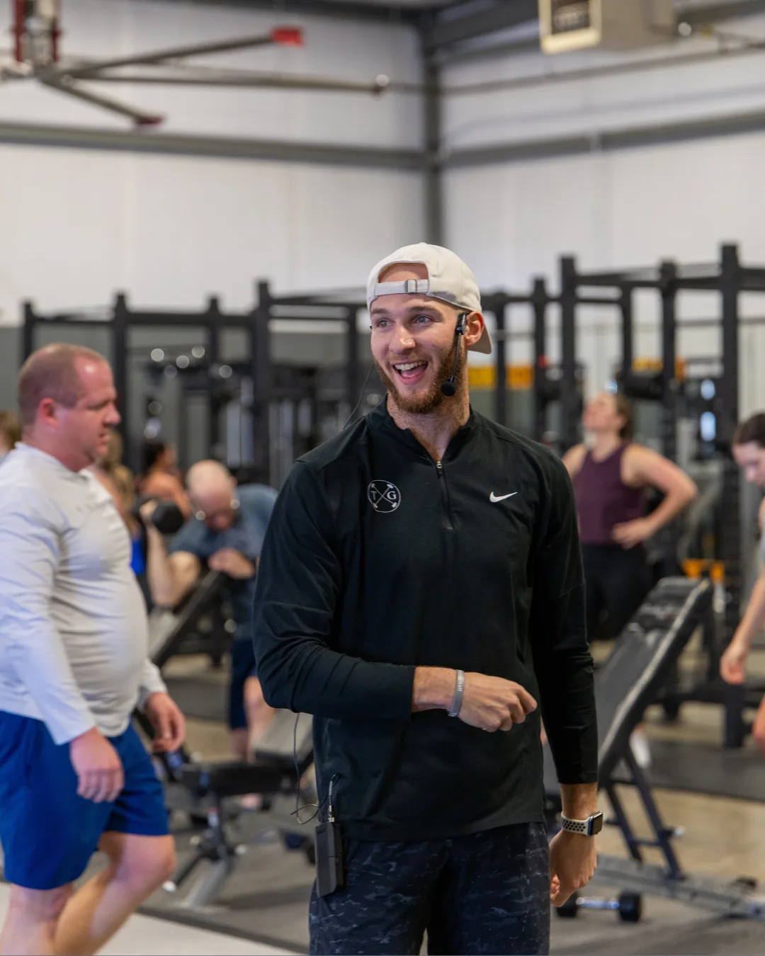 Personal trainer coaching a client one-on-one at True Grit Fitness in Edmond, Oklahoma