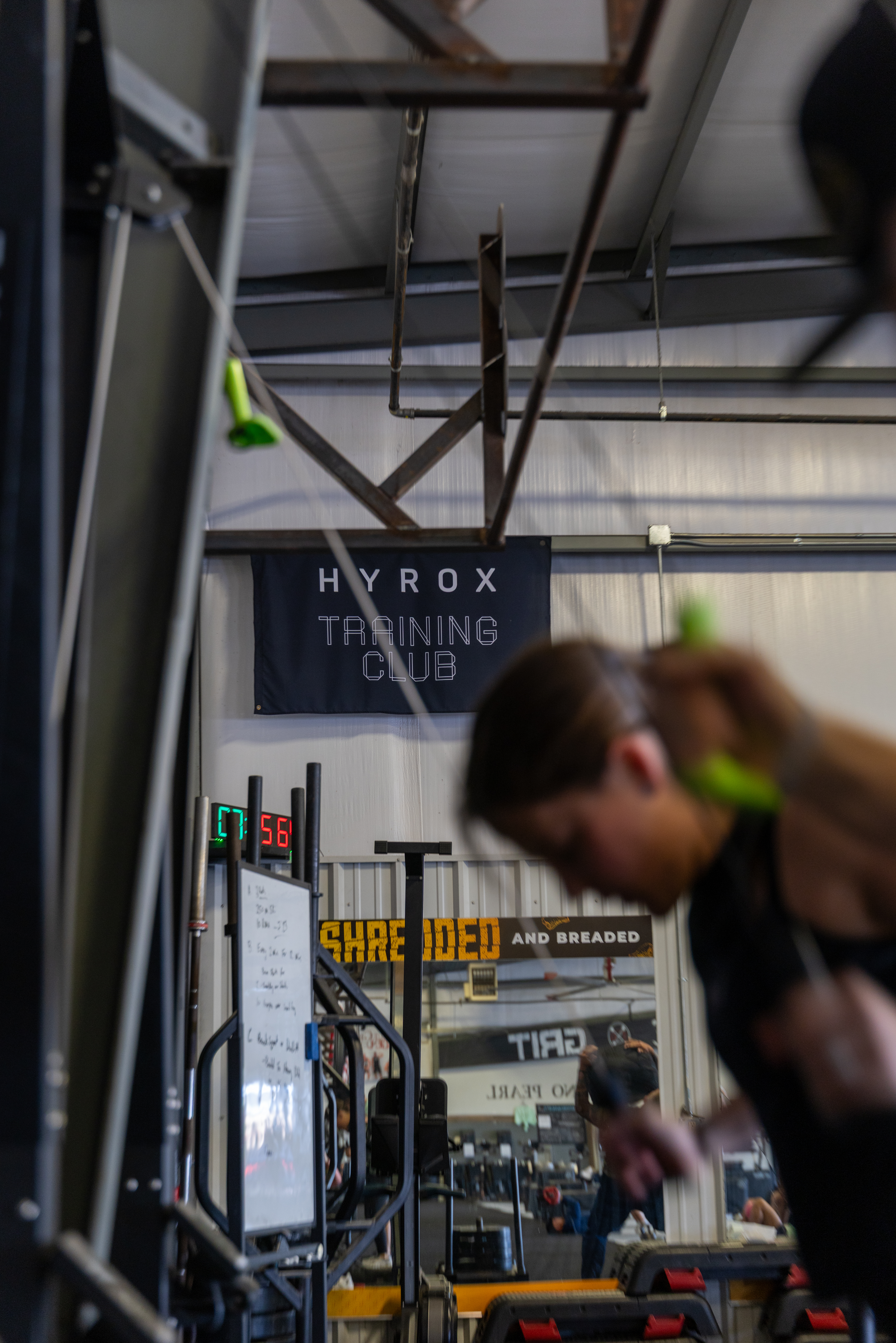 Athletes sprinting off the start line at the Hyrox Sprint hosted by True Grit Fitness in Oklahoma City
